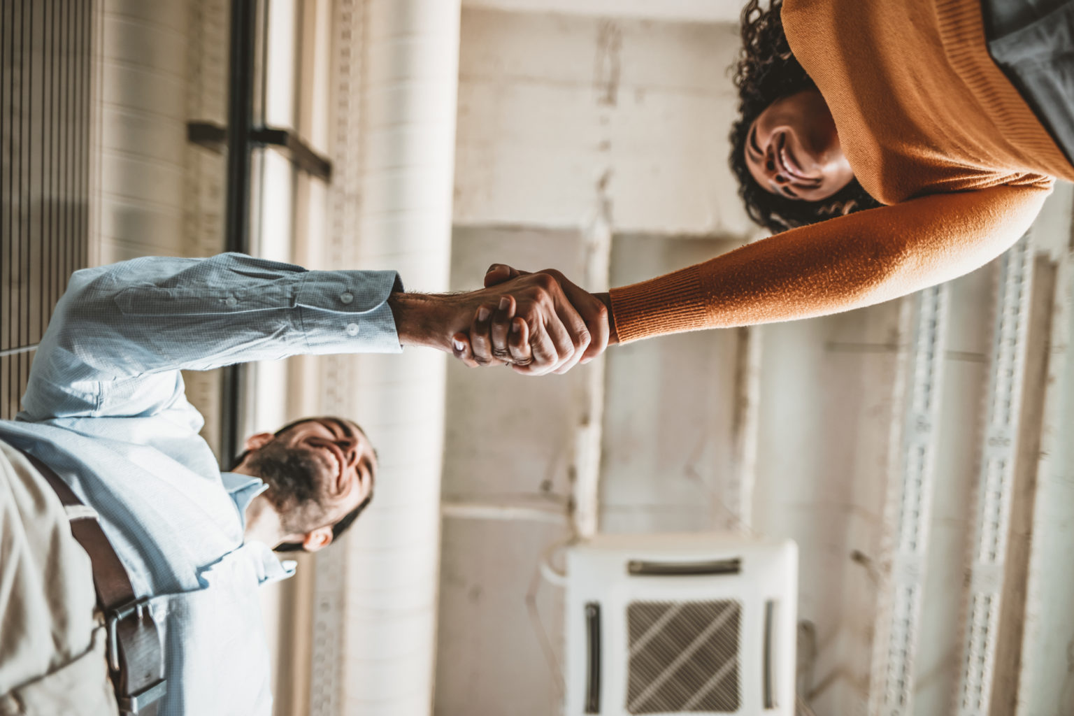 two-people-shaking-hands-national-agent-database